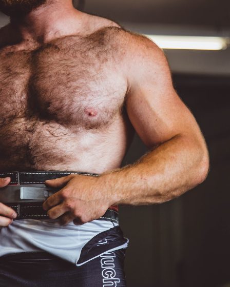 man wearing sauna belt